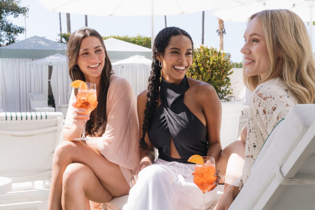 a group of women sitting outside