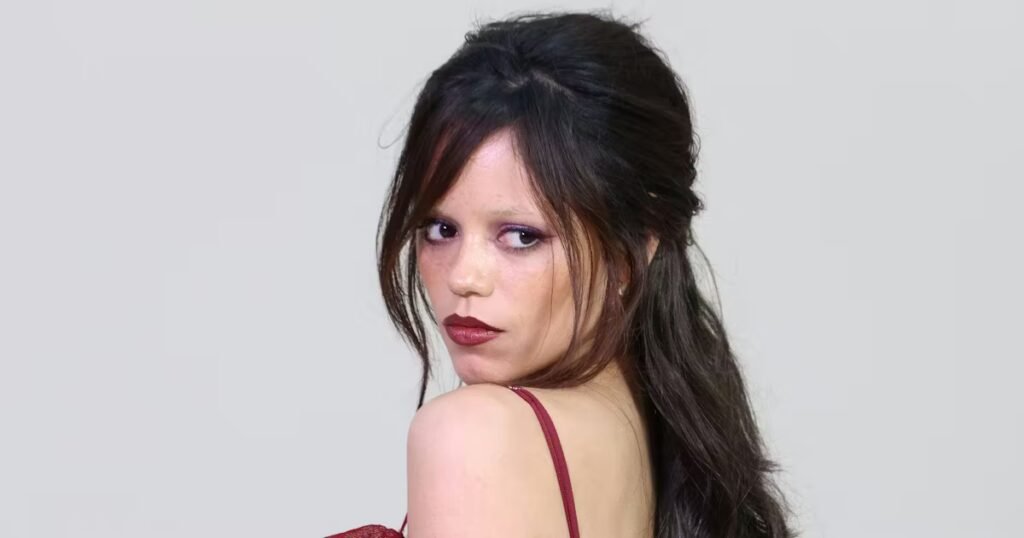 Jenna Ortega Makes the Case for Off-Season Sheer in See-Through Burgundy Look