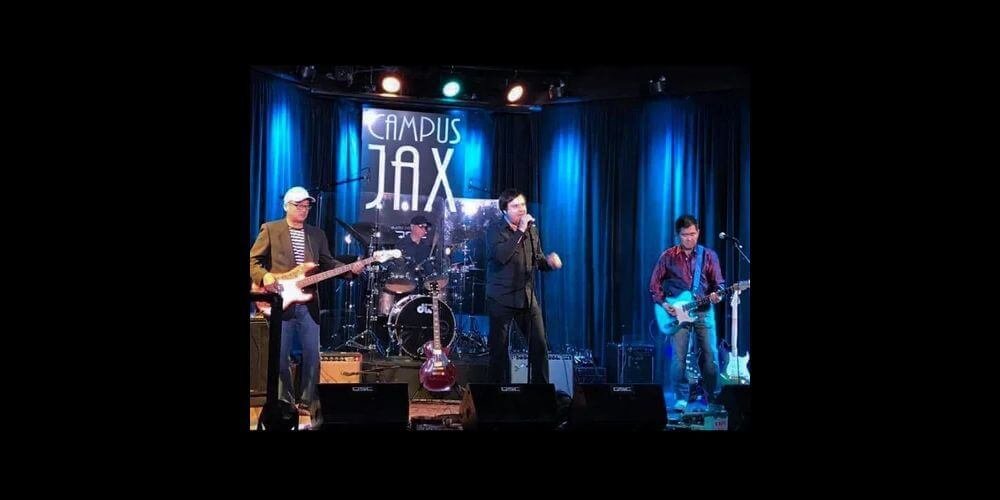 people on stage singing