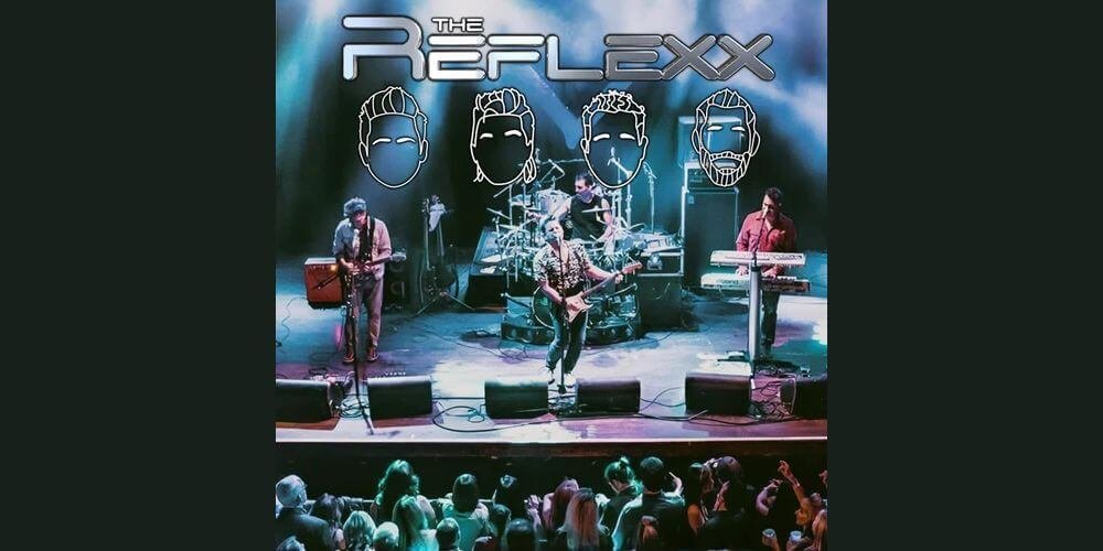 people on stage singing