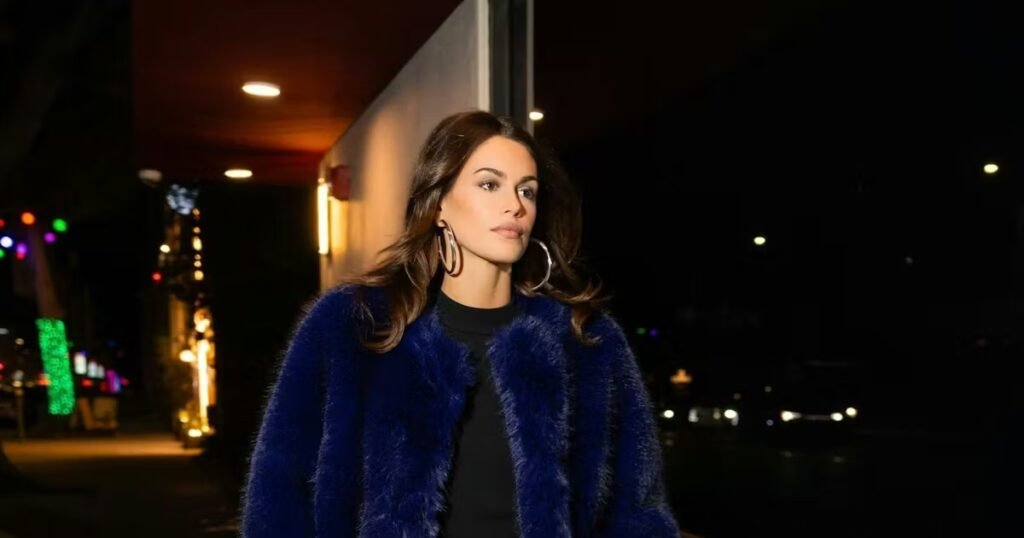 With a Big Fuzzy Coat, Kaia Gerber Brings Studio 54 Glam to the Holidays