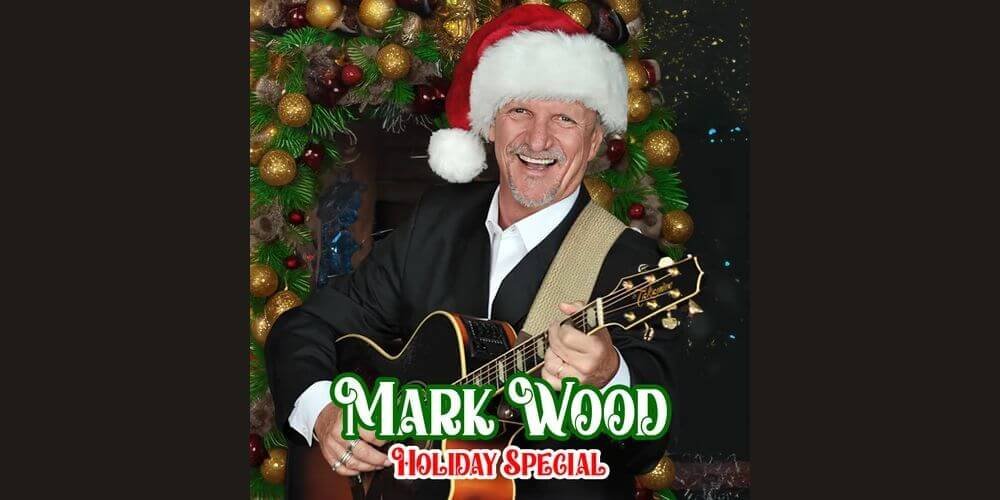 man holding a guitar