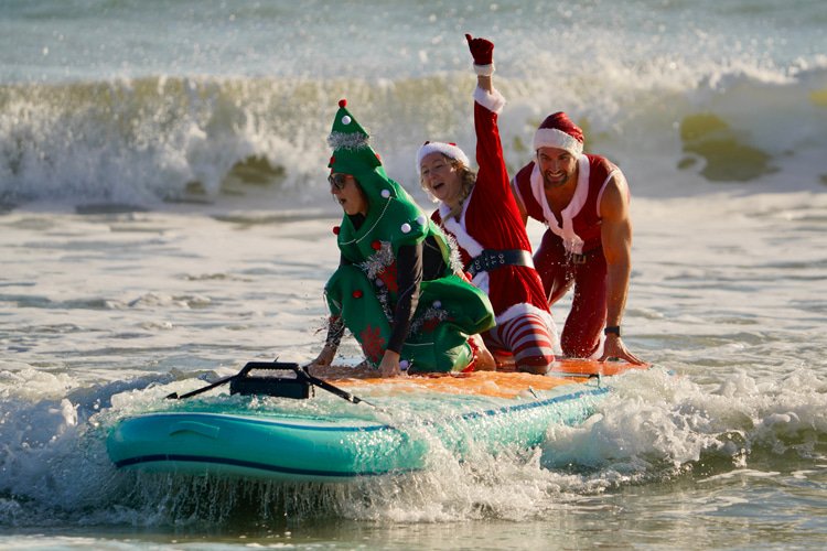 Surfing Santas 2025: party wave time at Cocoa Beach | Photo: NPI Productions/Dalton Smith