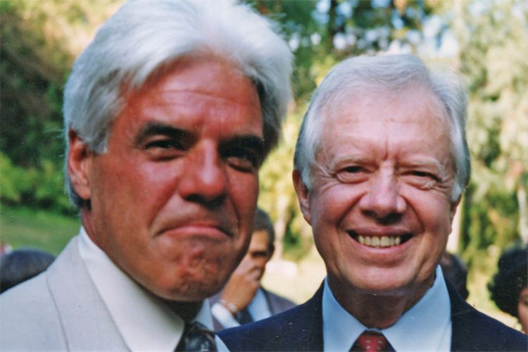 Surf Activist Robert Caughlan Dies at 82, Leaving Lasting Legacy Robert Caughlan and Jimmy Carter: a surfer and the US president united by a common vision to protect the ocean