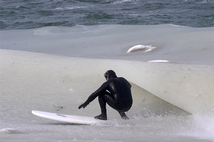 Montauk, New York: Ben Gravy rides a slushy wave