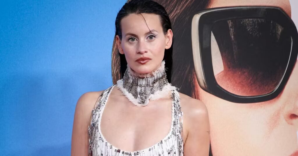 Milena Smit Transforms Safety Pins into High Fashion in Punk Slip Dress Milena Smit Gives Safety Pins a Couture Spin in Punk Slip Dress