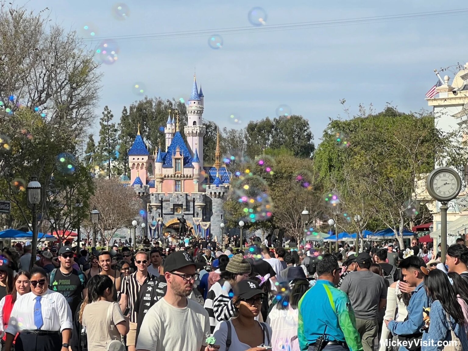 Disneyland Crowds to Soar Amid Popular Ticket Promotion Dates Disneyland big crowds in front of castle