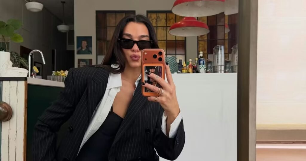 Dua Lipa Elevates High-Contrast Prints with Striking Speedy Bag Dua Lipa Boosts High-Contrast Prints With A High-Voltage Speedy Bag