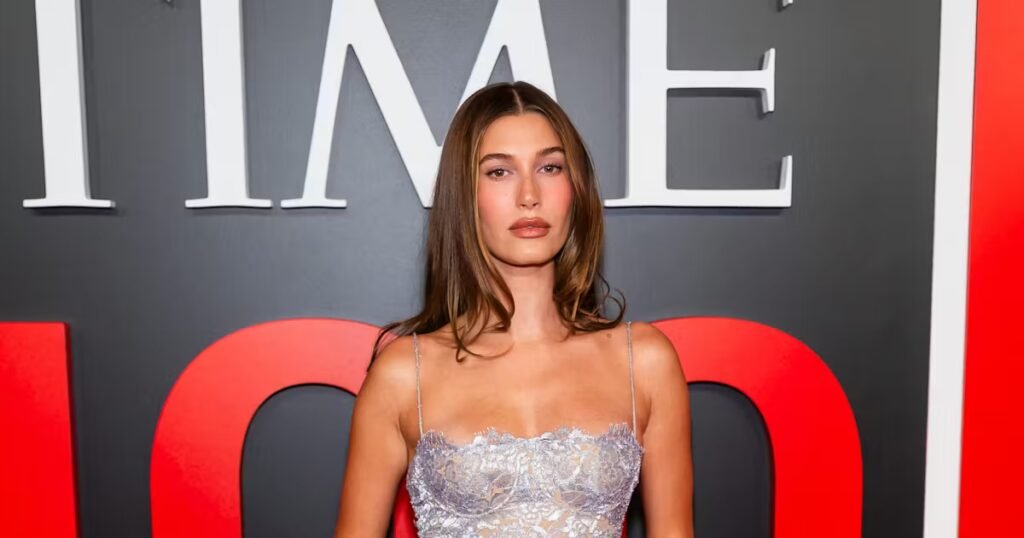 Hailey Bieber Channels Kelly Klein In a Very '90s Metallic Gown