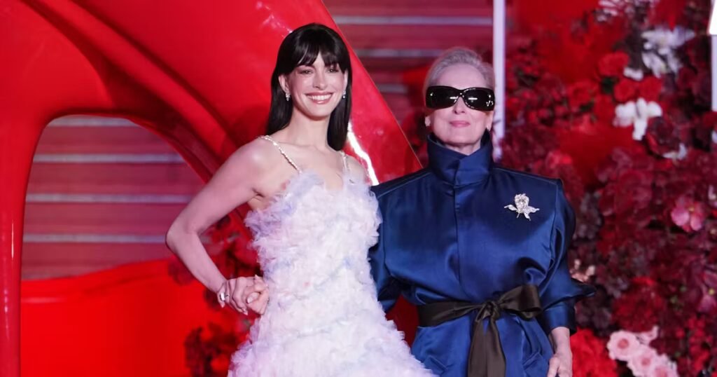 Anne Hathaway & Meryl Streep’s Red Carpet Looks Are Full of 'Devil'-ish Easter Eggs