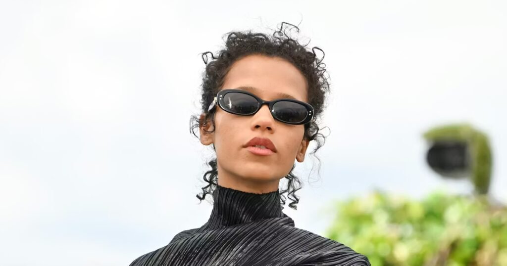 Taylor Russell Shines as Alien Superstar in Pleated Gown Taylor Russell Is an Alien Superstar In a Intergalactic Pleated Gown